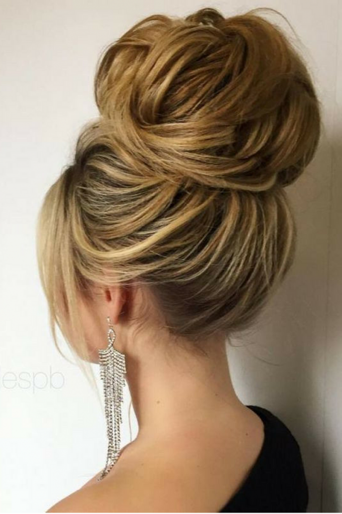 35 Enchanting Hairstyles for a Fairytale Wedding : Textured High Bun with  White Floral Hair Pins